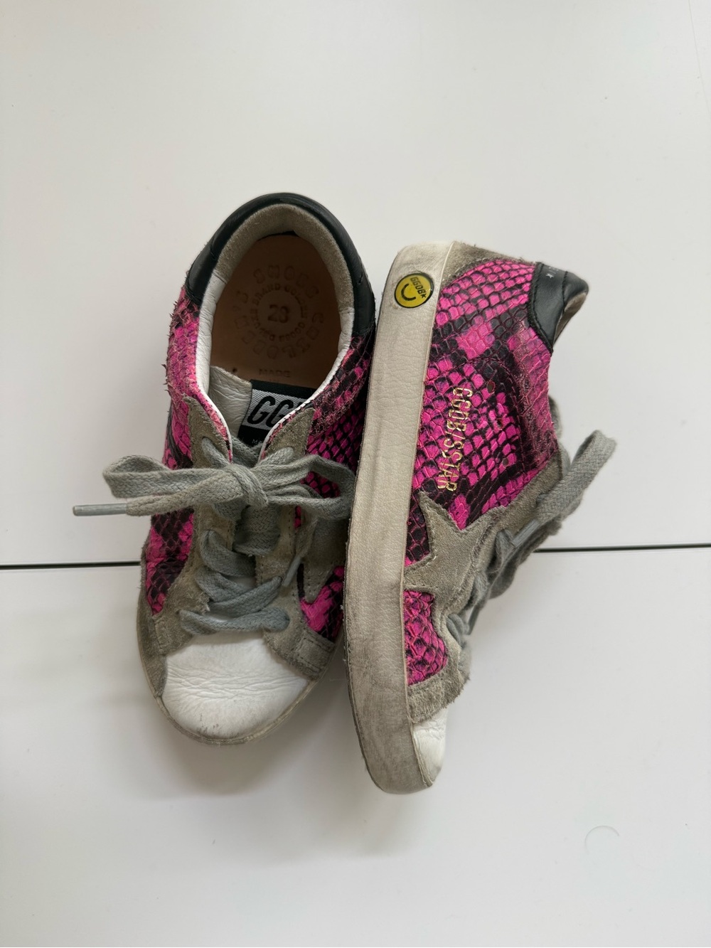Golden Goose Children’s pink snake skin sneakers